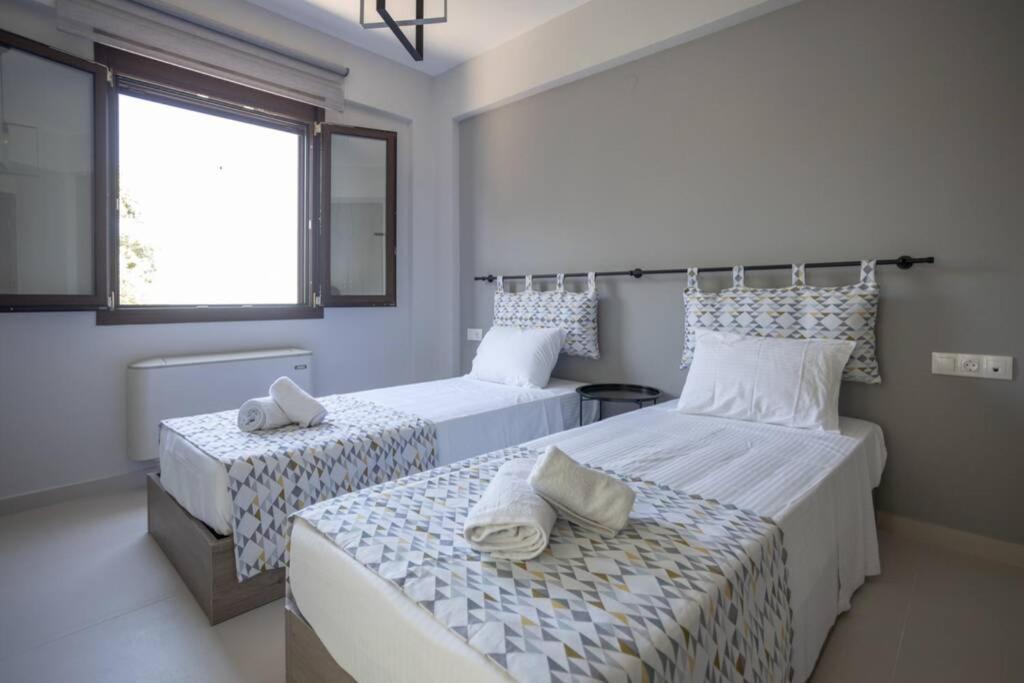 Mela Luxury Apartments Maroulás Dış mekan fotoğraf
